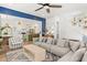 Spacious living room with a large sectional sofa, adjacent to an open-concept kitchen and dining area at 383 Oak Park St, Summerville, SC 29486