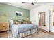 Comfortable main bedroom with ensuite bath, featuring soft lighting and natural textures at 383 Oak Park St, Summerville, SC 29486