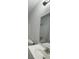Bathroom featuring a modern vanity, framed mirror, and a toilet at 4324 Purdue Dr, North Charleston, SC 29418