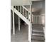 Staircase with white railings and carpeted steps, leading to the upper level of the home at 4324 Purdue Dr, North Charleston, SC 29418
