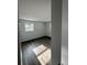 Cozy bedroom featuring hardwood floors, neutral walls, and natural light through windows at 4626 W W Montague Ave, North Charleston, SC 29418