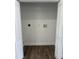 Spacious closet featuring hardwood floor and connections for washer and dryer at 4626 W W Montague Ave, North Charleston, SC 29418