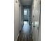 Hallway with hardwood flooring and modern trim at 4626 W W Montague Ave, North Charleston, SC 29418