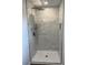 Modern walk-in shower with rain shower head and marble tile at 4626 W W Montague Ave, North Charleston, SC 29418