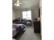 Bright bedroom with lots of natural light, neutral walls, and neutral-colored carpet at 4652 Nibbs Ln, North Charleston, SC 29418