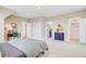 Spacious bedroom features views of hall, bathroom, and walk-in closet at 503 Ivy Green Ln, Summerville, SC 29486