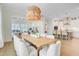 Elegant dining space overlooking the living room and kitchen, with modern decor at 503 Ivy Green Ln, Summerville, SC 29486