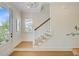 Bright entryway featuring hardwood floors, stairs, a window, and a door to the outside at 503 Ivy Green Ln, Summerville, SC 29486