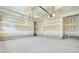 Spacious garage with concrete flooring and insulated walls, ready for your customization and storage needs at 503 Ivy Green Ln, Summerville, SC 29486