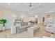 Bright living room boasts coffered ceilings and an open floor plan to the kitchen and dining area at 503 Ivy Green Ln, Summerville, SC 29486