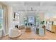 Bright living room with fireplace, coffered ceilings, and a sliding door that opens to the patio at 503 Ivy Green Ln, Summerville, SC 29486