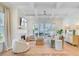 Bright living room with fireplace, coffered ceilings, and a sliding door that opens to the patio at 503 Ivy Green Ln, Summerville, SC 29486