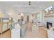 Bright living room with fireplace, open floor plan, and views of the kitchen and dining area at 503 Ivy Green Ln, Summerville, SC 29486