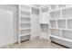 An organized walk-in closet includes shelving and racks for optimal storage and organization at 512 Pontoon Rd, Huger, SC 29450