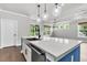 Stylish kitchen island with a farmhouse sink and sleek stainless steel dishwasher at 512 Pontoon Rd, Huger, SC 29450