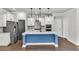 Modern kitchen featuring stainless steel appliances, a central island, and stylish pendant lighting at 512 Pontoon Rd, Huger, SC 29450