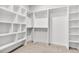 Spacious walk-in closet with built-in shelving and ample storage space at 512 Pontoon Rd, Huger, SC 29450
