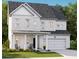 Charming two-story home with a covered porch and well-maintained front yard at 533 Verdi Dr, Summerville, SC 29486
