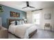 Bedroom with a blue accent wall and cozy queen size bed at 543 Verdi Dr, Summerville, SC 29486