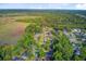 Capture of a residential area bordering an extensive marshland, showcasing community amidst nature at 5433 Clearview Dr, North Charleston, SC 29420