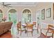Cozy dining area with natural light, hardwood floors, and comfortable seating for Gathering meals at 5433 Clearview Dr, North Charleston, SC 29420