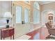 Bright foyer featuring diamond-paned double doors and rich hardwood flooring at 5433 Clearview Dr, North Charleston, SC 29420