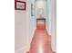 Long hallway with hardwood floors and light blue walls at 5433 Clearview Dr, North Charleston, SC 29420