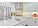 Gourmet kitchen with stainless steel appliances, custom cabinetry, and a spacious island at 5433 Clearview Dr, North Charleston, SC 29420