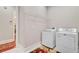 Laundry room with washer, dryer and wire rack at 5433 Clearview Dr, North Charleston, SC 29420