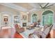 Cozy living room with a fireplace, built-in shelves, and comfortable leather seating at 5433 Clearview Dr, North Charleston, SC 29420