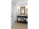 Clean bathroom with vanity, black countertop, and shower-tub combination at 5802 Palmetto Dr # B-521/519, Isle of Palms, SC 29451
