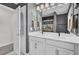 Modern bathroom featuring a double vanity, gray walls, and a car-themed shower curtain at 661 Black Pine Rd, Moncks Corner, SC 29461