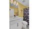 Bathroom with white vanity, patterned shower curtain and star wall decoration at 661 Black Pine Rd, Moncks Corner, SC 29461