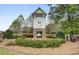 Picturesque community watchtower with a lovely pond and fountain view surrounded by lush foliage at 661 Black Pine Rd, Moncks Corner, SC 29461