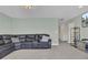 Comfortable living area with a large sectional sofa and neutral decor at 661 Black Pine Rd, Moncks Corner, SC 29461
