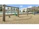 Charming swing set area near a refreshing community pool, creating an inviting outdoor recreation space for families at 661 Black Pine Rd, Moncks Corner, SC 29461