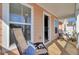 Relaxing covered porch with comfortable seating and a view of the surrounding neighborhood at 661 Black Pine Rd, Moncks Corner, SC 29461
