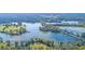 Expansive aerial view showcasing a network of lakes and green spaces, a true natural paradise at 774 Clay Field Trl, Summerville, SC 29485
