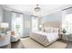 Serene bedroom with a tufted headboard, soft lighting, and a tranquil ambiance at 774 Clay Field Trl, Summerville, SC 29485
