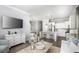 Bright living room with stylish furniture and an open layout connecting to the kitchen at 774 Clay Field Trl, Summerville, SC 29485