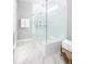 Modern bathroom featuring a glass-enclosed shower, marble floors, and stylish fixtures at 784 Clay Field Trl, Summerville, SC 29485