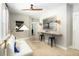 Cozy bonus room featuring a built-in desk, comfortable seating, and ample natural light at 784 Clay Field Trl, Summerville, SC 29485