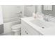 Clean, well-lit bathroom with shower-tub combination and white cabinets at 786 Clay Field Trl, Summerville, SC 29485