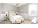 Bright bedroom features soft natural light, neutral color palette and cozy furniture at 786 Clay Field Trl, Summerville, SC 29485