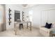 Well-lit home office with a modern desk, comfortable seating, and stylish wall decor at 786 Clay Field Trl, Summerville, SC 29485