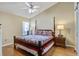 Comfortable bedroom with a ceiling fan and a window letting in natural light at 7896 Montview Rd, North Charleston, SC 29418