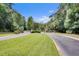 Inviting community entrance with manicured landscaping, and a gated entry at 7896 Montview Rd, North Charleston, SC 29418