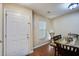 A well lit dining room featuring a dining table, six chairs, and wood flooring at 7896 Montview Rd, North Charleston, SC 29418