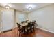 Open dining area with a dining table set, light fixtures, and a clean, inviting atmosphere at 7896 Montview Rd, North Charleston, SC 29418