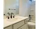Bright bathroom features a shower-tub combination and modern vanity with black fixtures at 8633 Connor Ct, North Charleston, SC 29406
